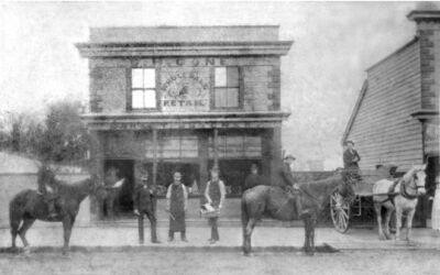 First butchers shop cnr High and Ashley St. George Cone on horse left and son George Herbert (right)